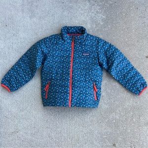 Patagonia Down Sweater Girls size 5T Blue/Multi Floral Coat with Red Interior.